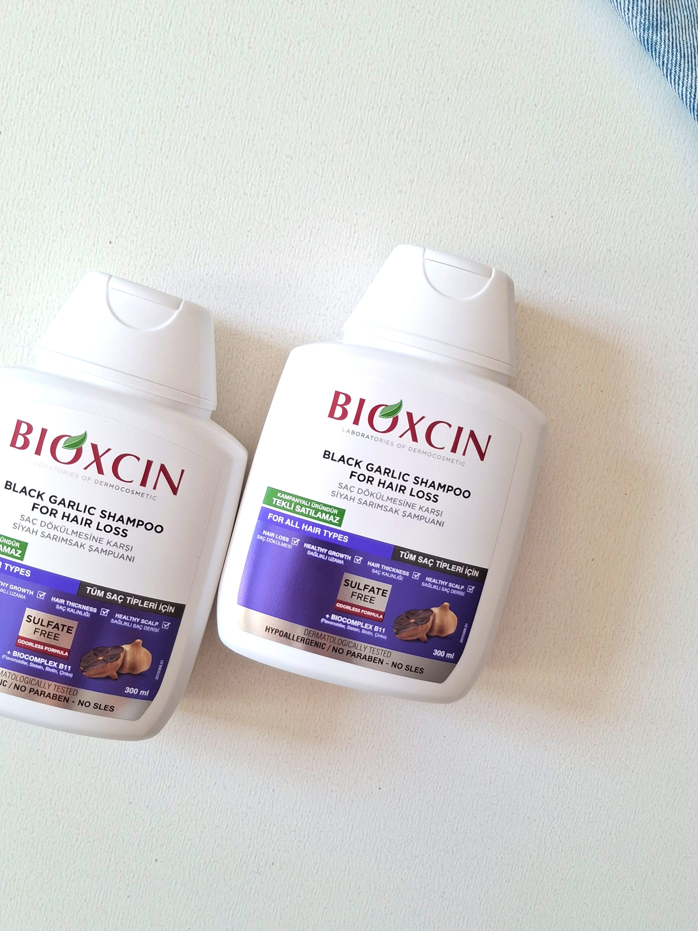 شامپو سفید سیر سیاه بیوکسین Bioxcin بدون سولفات حاوی عصاره سیر سیاه ضد ریزش و تقویت‌کننده مو مناسب موهای چرب ضعیف و شکننده حجم ۳۰۰میل